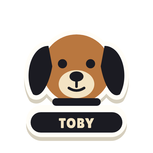 Clac con forma de la cara de un perro y el texto «TOBY»